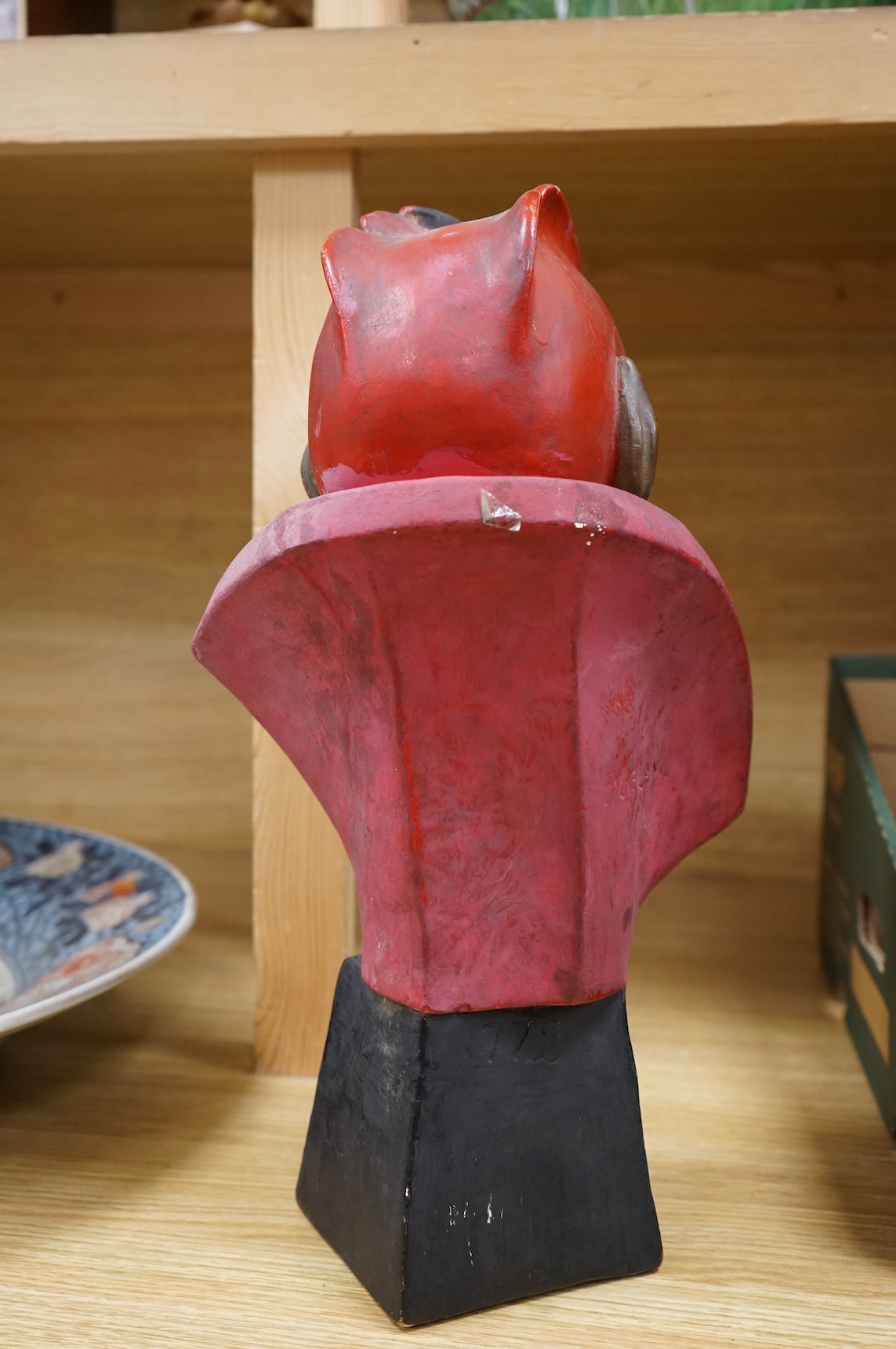 An Art Deco painted pottery bust of Mephistopheles, signed Joel Oni?, 38cm